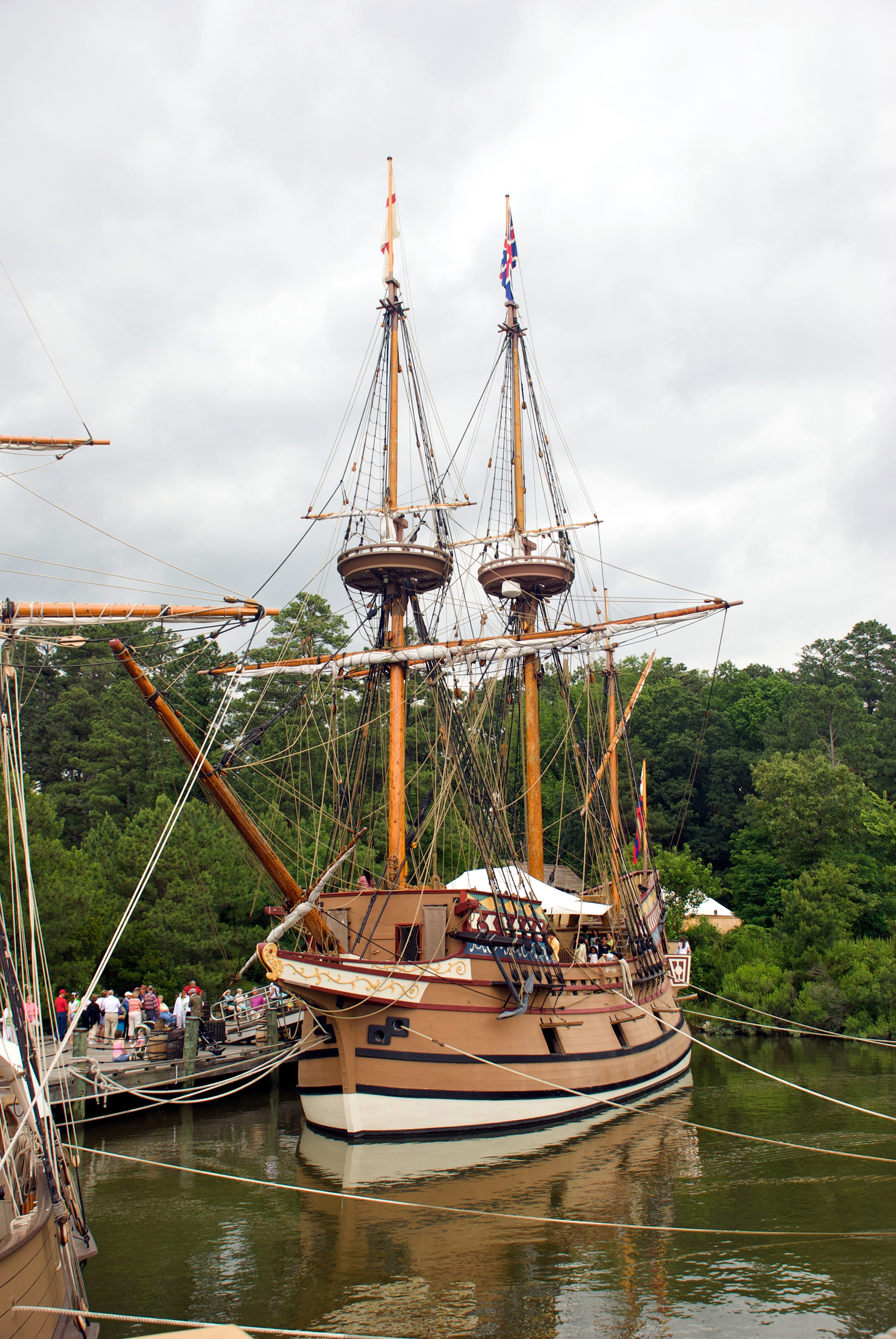 This merchant ship is a replica of the Susan Constant, a 120-ton galleon built around 1604 that took 71 male colonists across the Atlantic Ocean to Jamestown in 1606. A year later, the ship then returned to England and probably continued to transport goods across the seas – she apparently served as a merchant ship until at least 1615. The ship represents a key factor in the English economy—the international trade that made possible the many exchanges of paper, wine, spices, domestic goods and raw materials that were central to early modern middling life – our groups were producers, consumers and traders, so intimately connected to the movement of things over the water. <br />
<br />
A significant number of our upper middling groups, based in port towns, made their money and gained influence from the goods they transported into and out of England. Vessels like this one made possible contact not only with trading neighbours such as France but with areas as far afield as the West Indies and China. Many of the wealthier individuals of early modern England directly profited from the trading activities and ventures of these ships and their crew—either by their involvement as merchants or through “joint-stock organisations” such as the East India Company—and others benefited indirectly from the goods that passed through the land and made possible labour from cooking to woodworking. <br />
<br />
These boats were ocean-going then, but a large fleet of smaller vessels were engaged in the coastal trade – they moved goods from the larger ports around the British coast and up the island’s smaller waterways in bulk, so that they could then be broken down into smaller parcels of items for sale in the provinces’ shops and by travelling salespeople such as pedlars and chapmen. <br />
<br />
This ship also speaks to the colonialist project emerging in early modern Europe, the Susan Constant in particular notable for its role in the colonisation of the Americas. In addition, the ship speaks to the greatest early modern movement of people, the slave trade in which many notable English sailors and merchants, such as John Hawkins, were engaged. The scholar Imtiaz Habib’s archival research into the lives of African men and women in early modern England has demonstrated that many held socially significant positions and roles in European society which would usually confer middling status, such as ‘haberdasher’, ‘musician, ‘silkweaver’, ‘soldier’, ‘royal page’, or ‘diver’. Yet, as the scholar Ambereen Dadhaboy’s work shows, regardless of their occupational status, the position occupied by black people in Elizabethan England was “socially, culturally, and politically precarious”, and race therefore has a complex relationship with social and economic descriptions like “middling”. Boats such as the one above therefore represent a key influence on middling mobility of both people and goods, but they can also indicate the often violent, destructive, and ongoing legacy of early imperial action.
